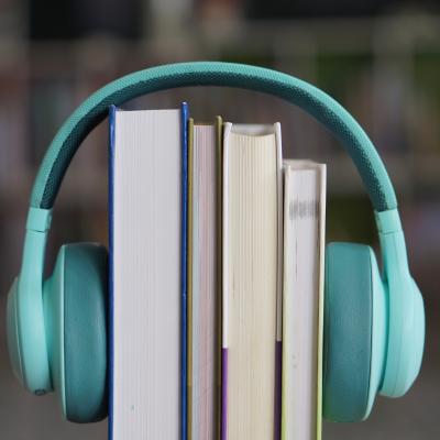 Photo of headphones on books