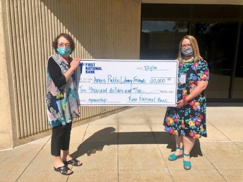 First National Bank, Ames, presents $10,000 check to Ames Public Library Friends Foundation
